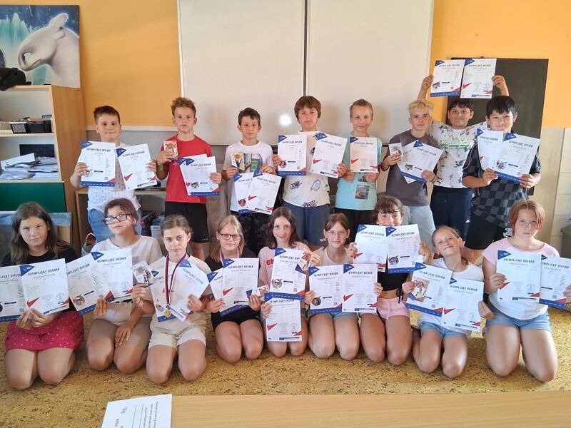 Olympijské diplomy a olympijský odznak